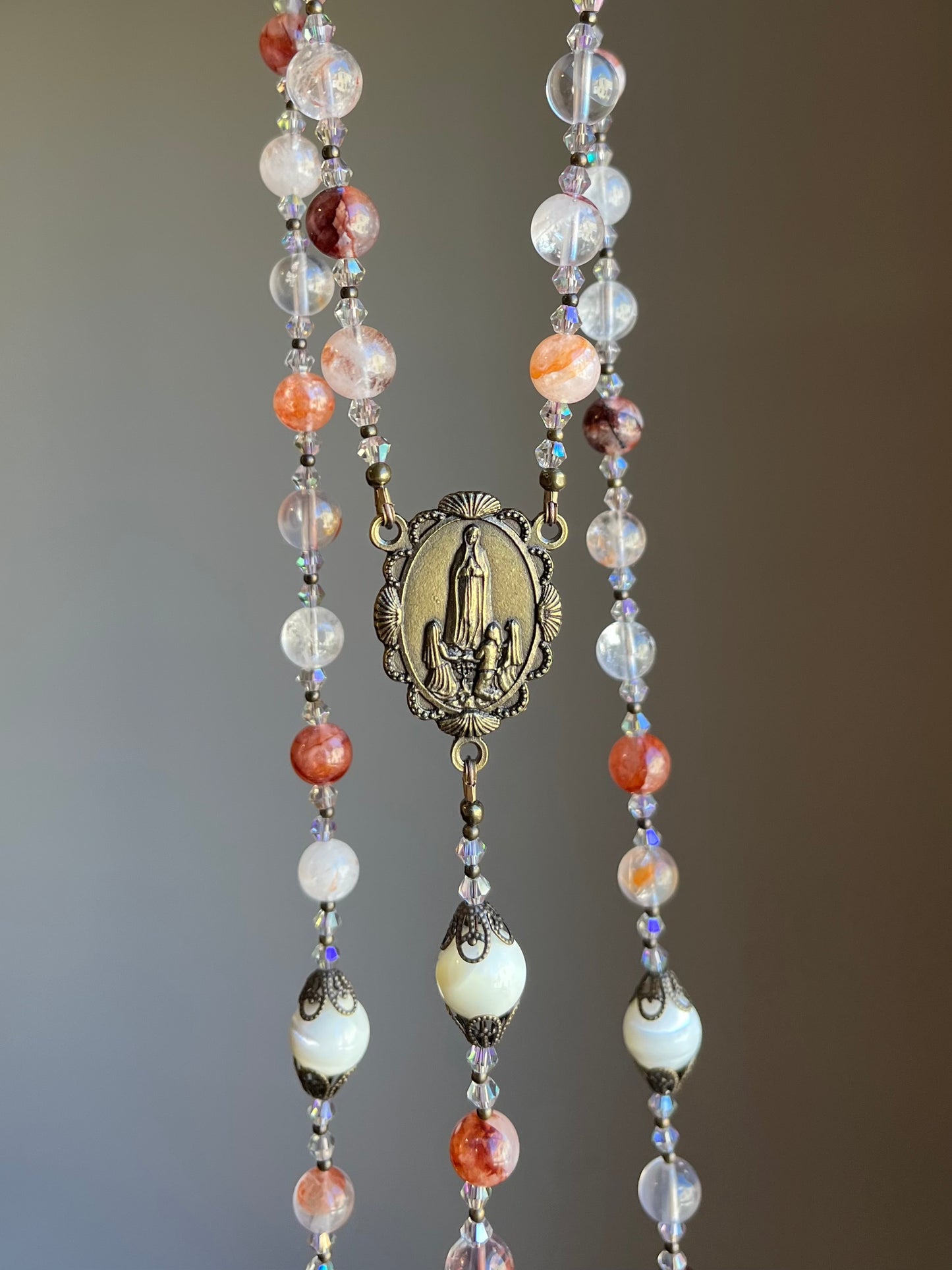 Red Lepidolite Rosary with Our Lady of Fatima Centerpiece and Ornate Brass Crucifix
