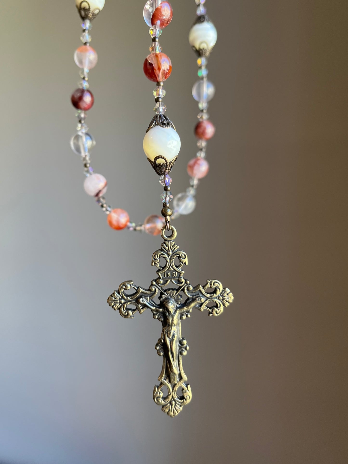 Red Lepidolite Rosary with Our Lady of Fatima Centerpiece and Ornate Brass Crucifix